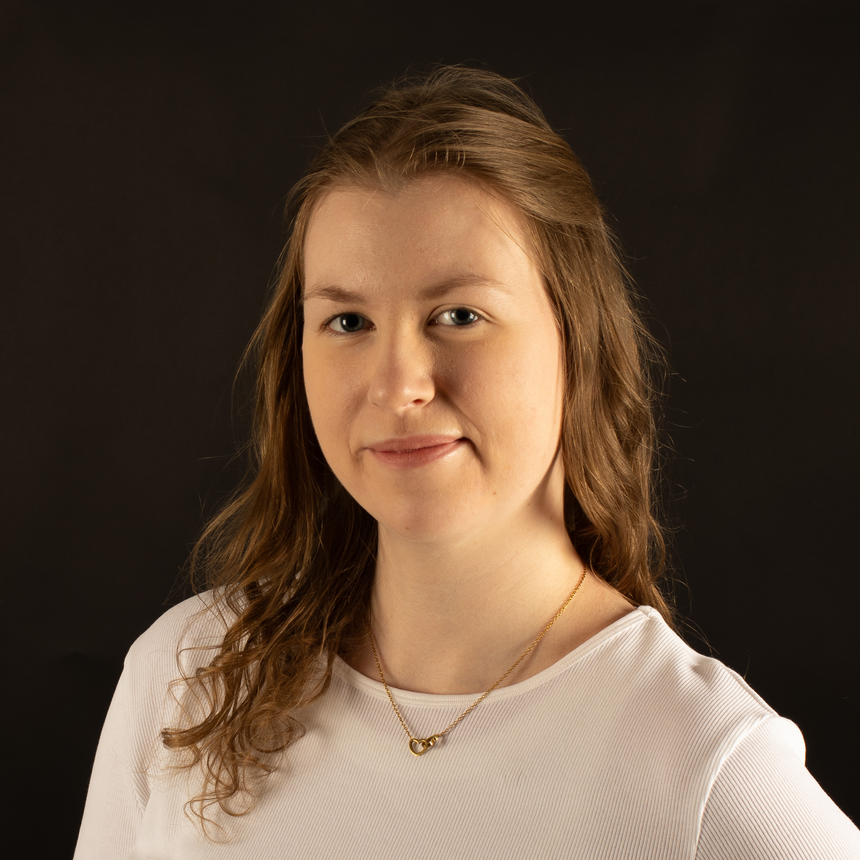 Personal headshot photo of me with the round border.